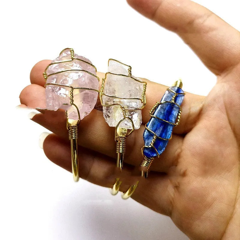 Natural crystal rough stone bracelet with gold winding metal accents in geometric bohemian style