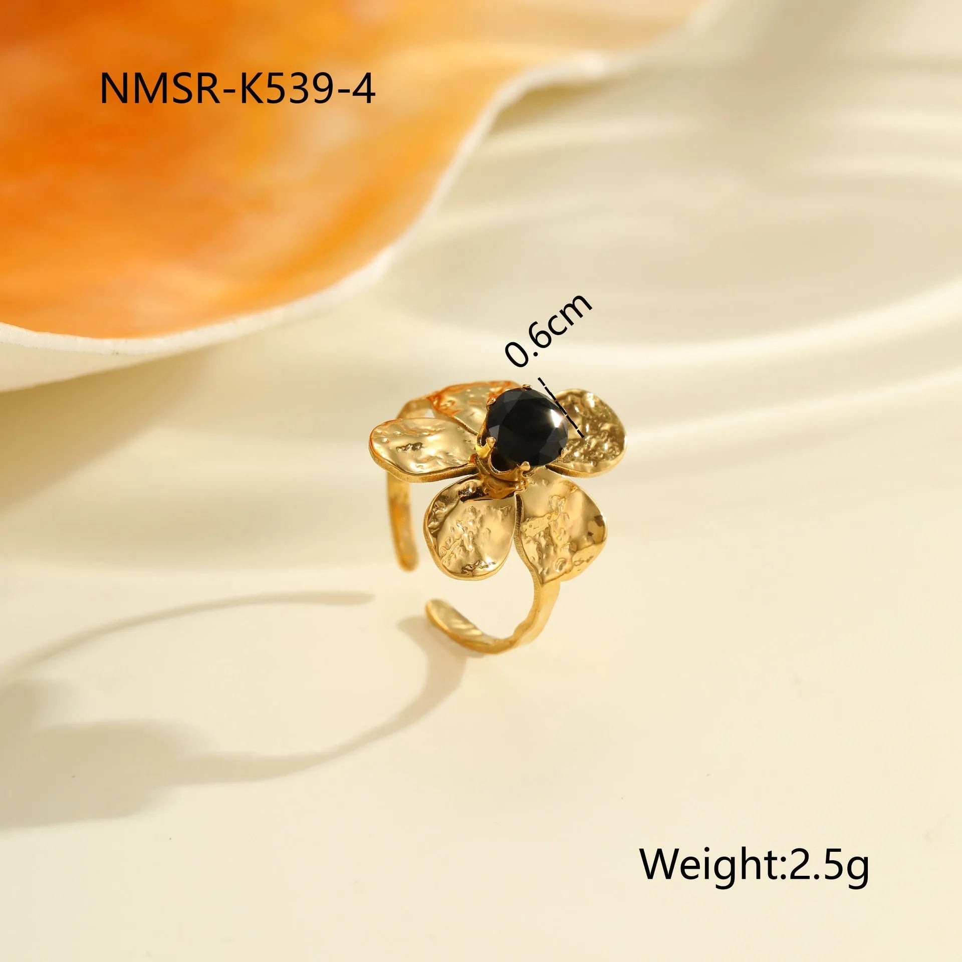 Geometric stainless steel ring for women with zircon detail and open adjustable design.