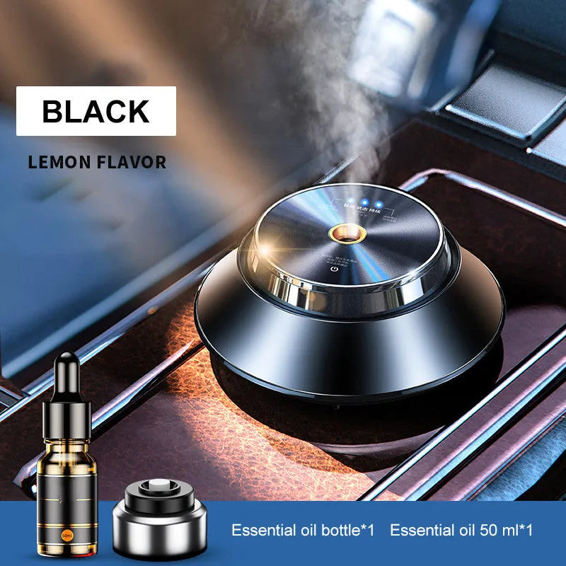 Black metal butterfly-shaped car aromatherapy diffuser with USB cable and essential oil bottle