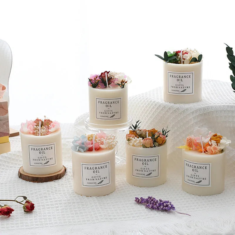 Glass jar scented candle with dried flower decoration, available in multiple fragrance options