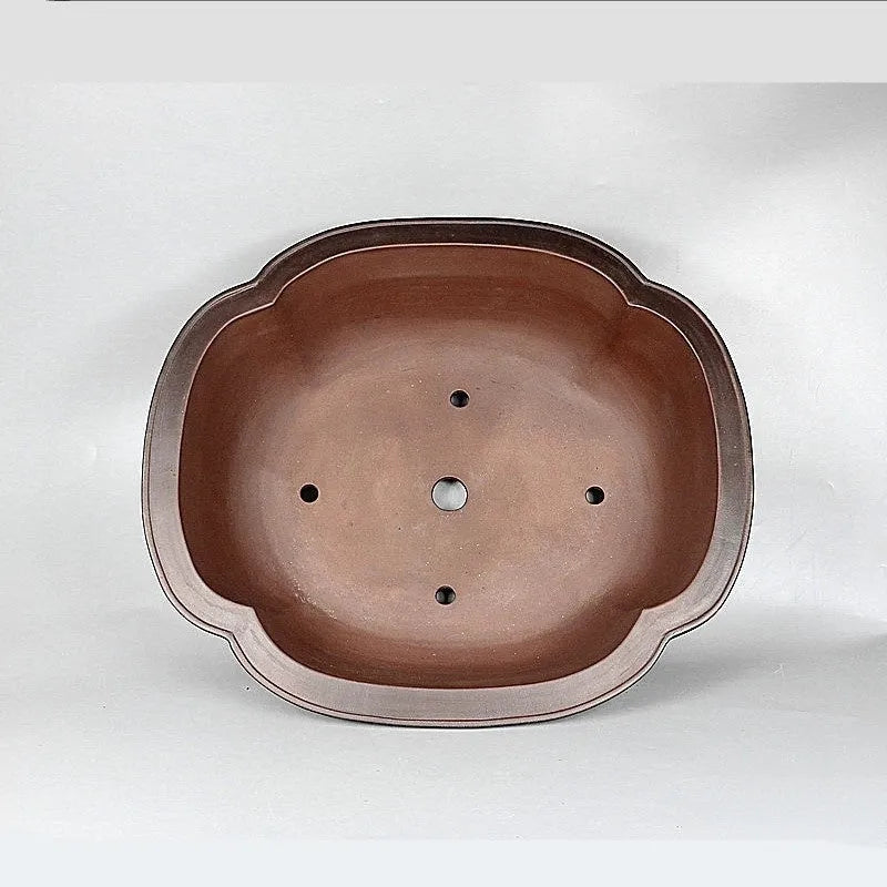 Handmade large purple clay crabapple-shaped flower pot measuring 74cm by 61cm.