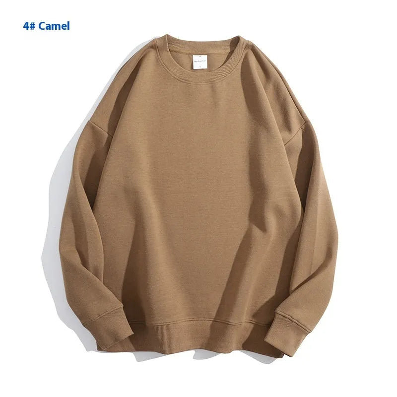 Women's loose fit cotton off shoulder sweater in a solid colour on a hanger.