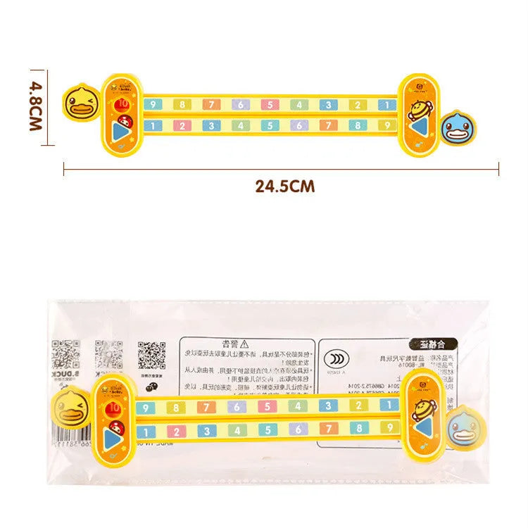 Yellow plastic children's digital decomposition ruler showing cartoon design and 24.5 cm scale