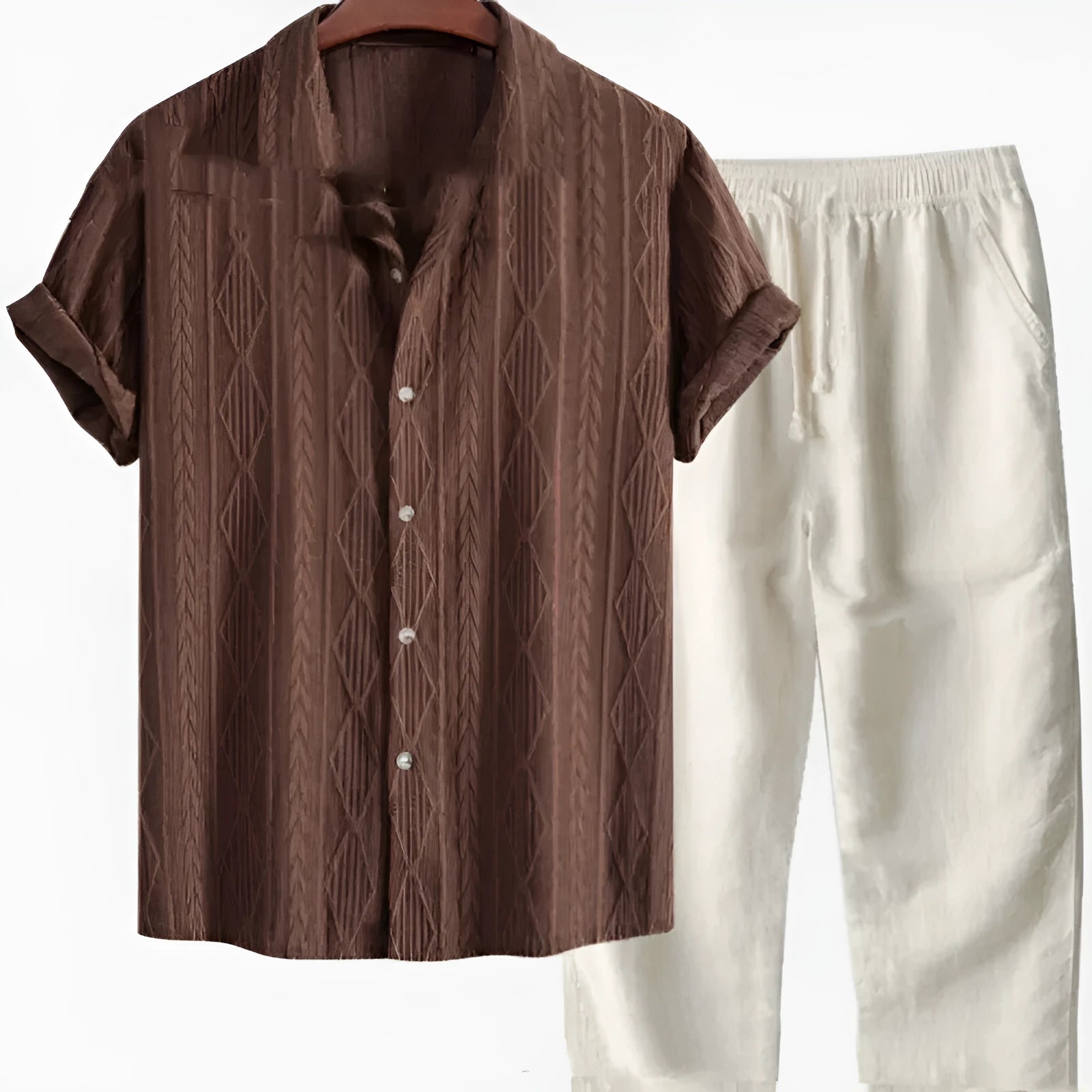 Man wearing a loose-fit light blue short sleeve shirt and matching trousers from a milk silk summer suit.