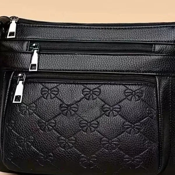 Butterfly black women's crossbody messenger bag with embossing details and horizontal square shape