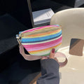 Blue bohemian straw beach bag with shell shape and single shoulder strap