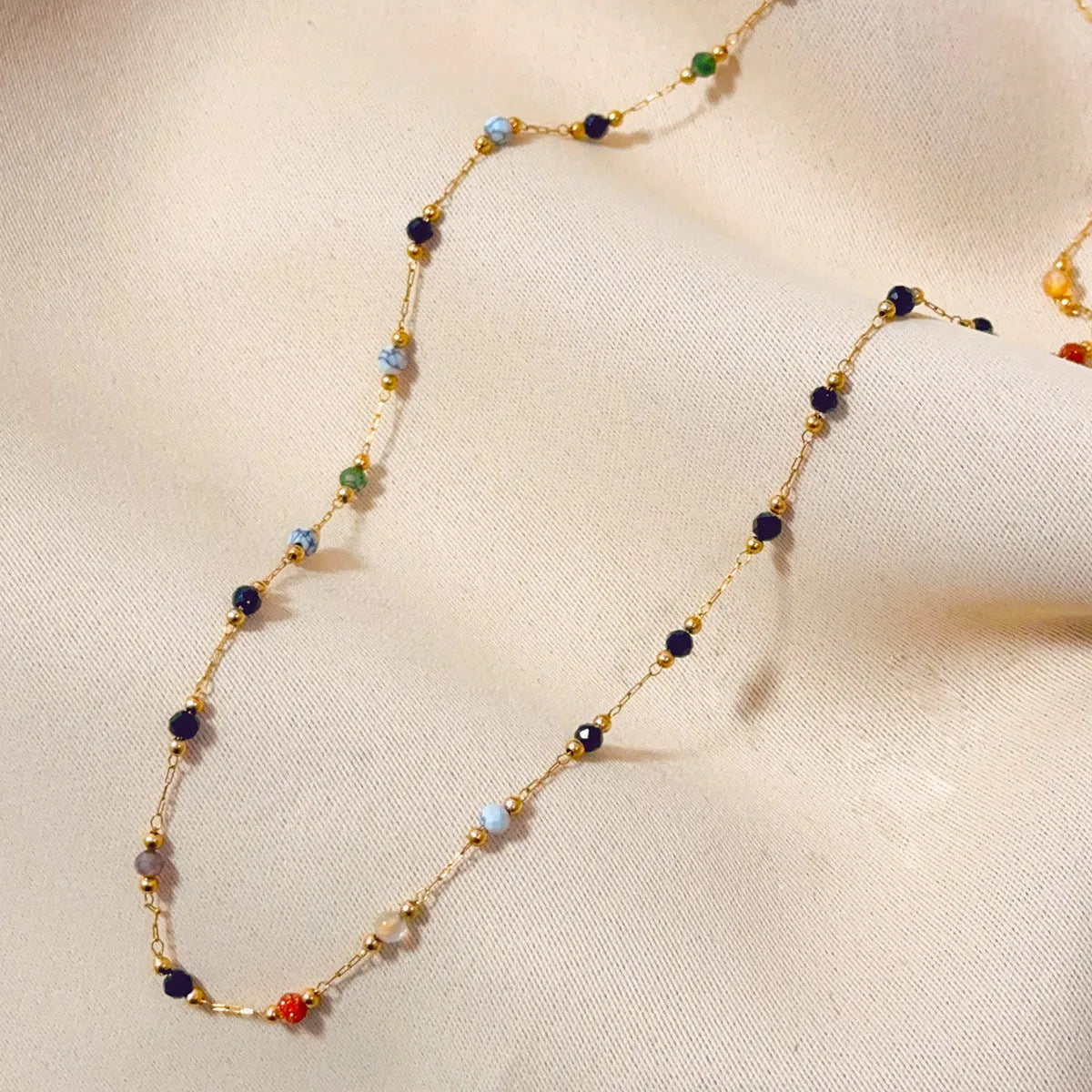 Women's titanium steel necklace with natural stone pendant and gold electroplated chain