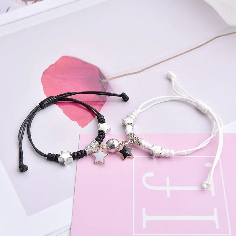Magnetic couple bracelets with crown and diamond designs in alloy electroplated construction