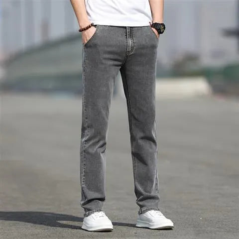Men's smoky gray jeans with straight leg cut and rabbit fur fabric showing zip fly closure