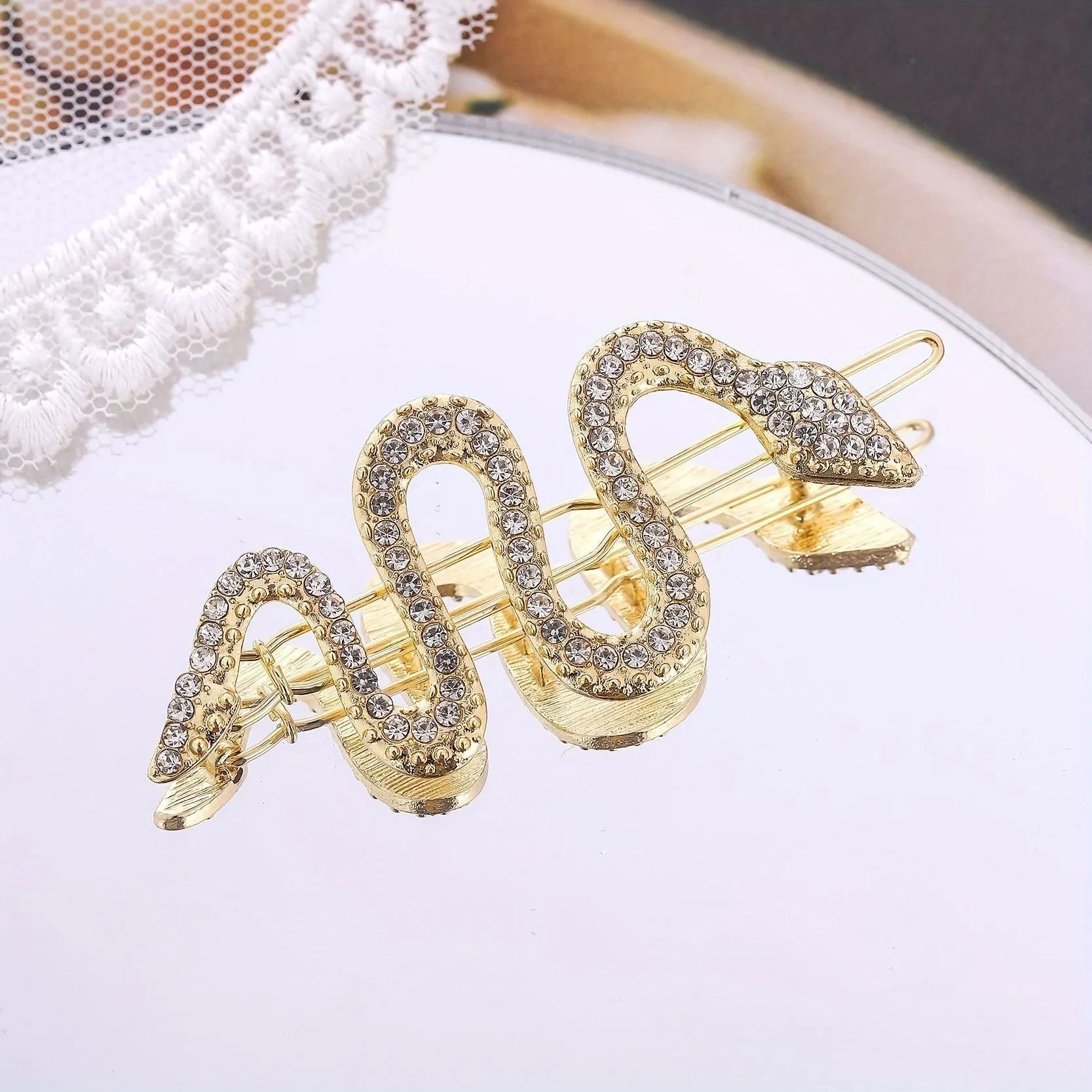 Korean style vintage snake design hair barrette in gold or silver alloy.