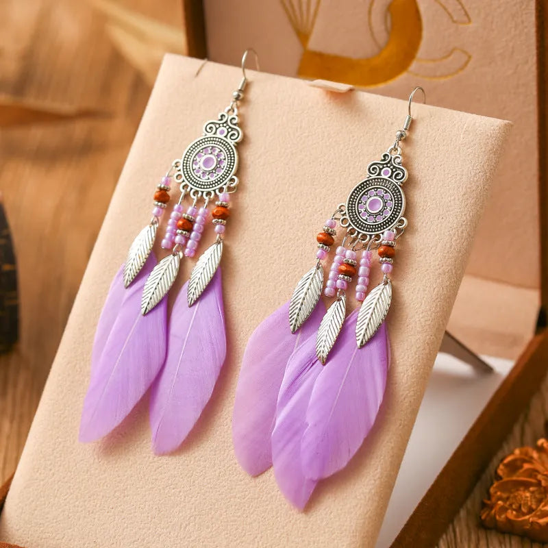Feather pattern drop earrings with round oil craft design in alloy with electroplated finish