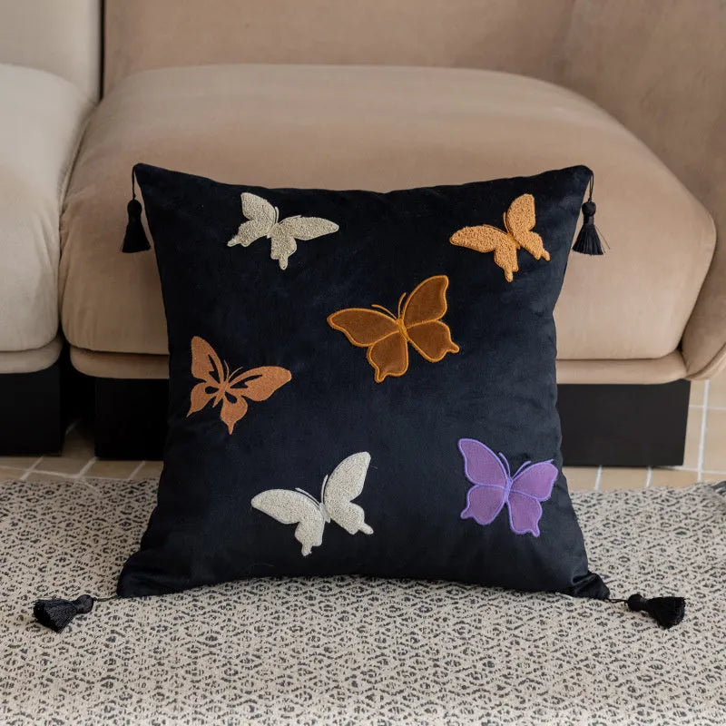 Square butterfly embroidered cushion in beige, black, or purple colour options