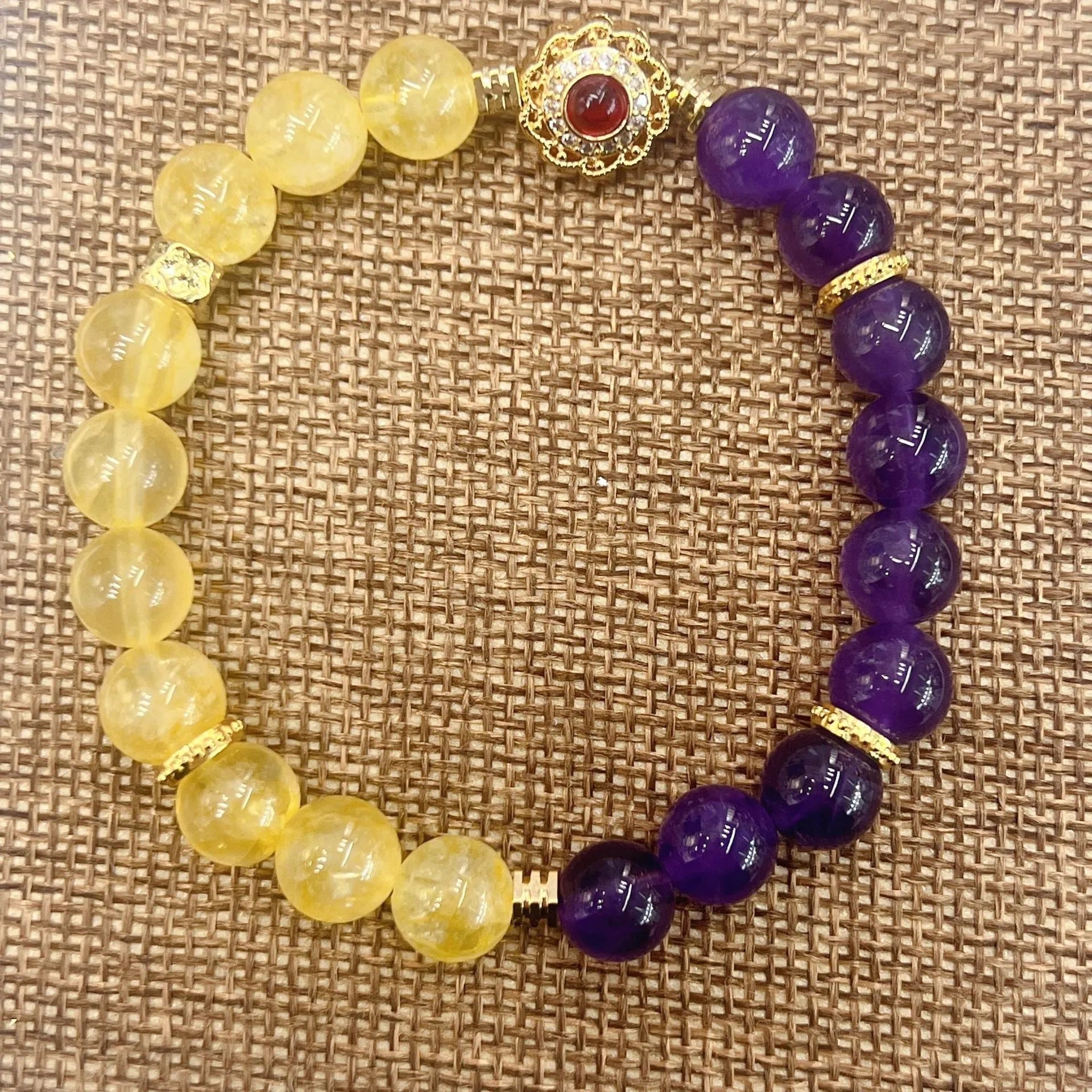 Handmade women's yellow and purple crystal bracelet with amethyst beads