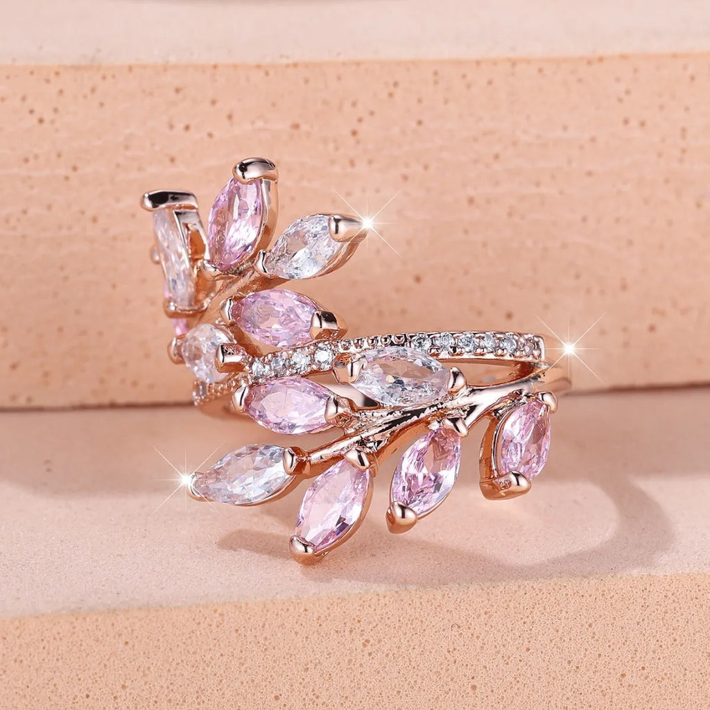 Adjustable copper leaf ring with horse eye zircon accents in multiple colour variations