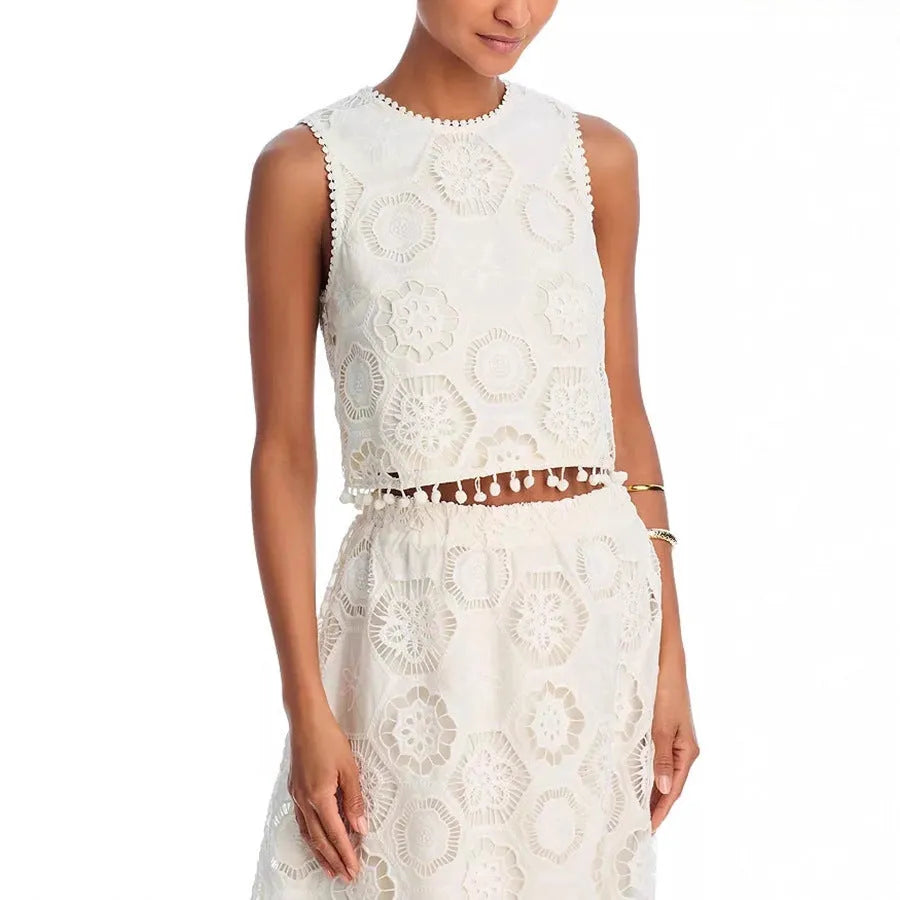 White women's sleeveless top and long skirt suit with retro embroidery detailing