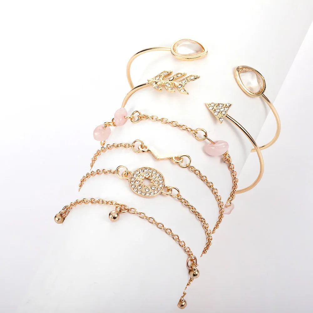 6 piece gold women's bracelet set with water droplet and arrow-shaped charms on zinc alloy construction