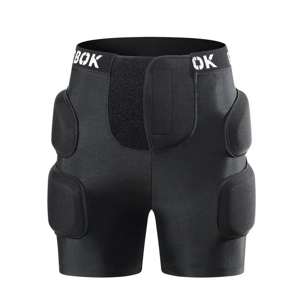Black protective spandex trousers with integrated hip pads for skating and skateboard fall protection.