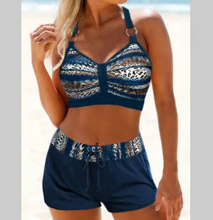 Women's two-piece polyester swimsuit bikini in printed designs available in S, M, L, XL sizes