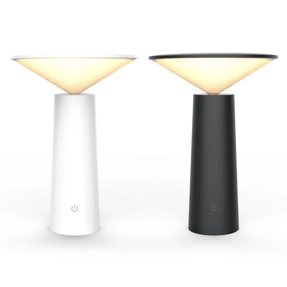 Black USB rechargeable desk lamp with touch sensor and adjustable lamp head on a wooden table.