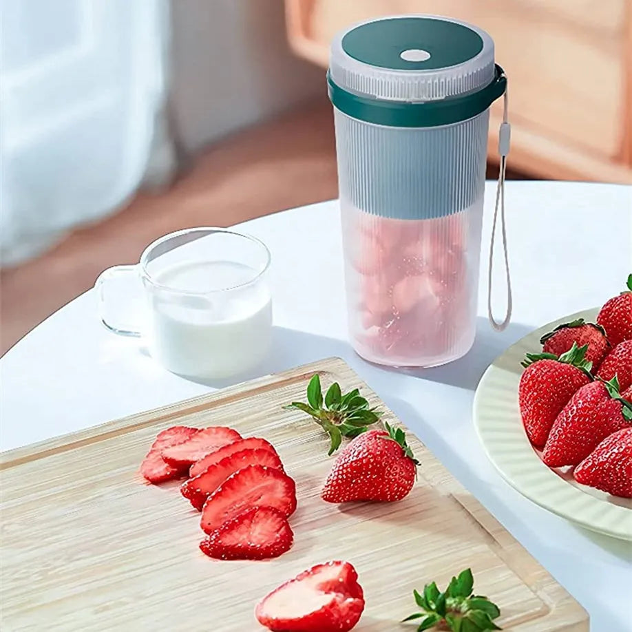 Portable USB rechargeable blender juicer cup in blue with 300ml capacity and stainless steel blades
