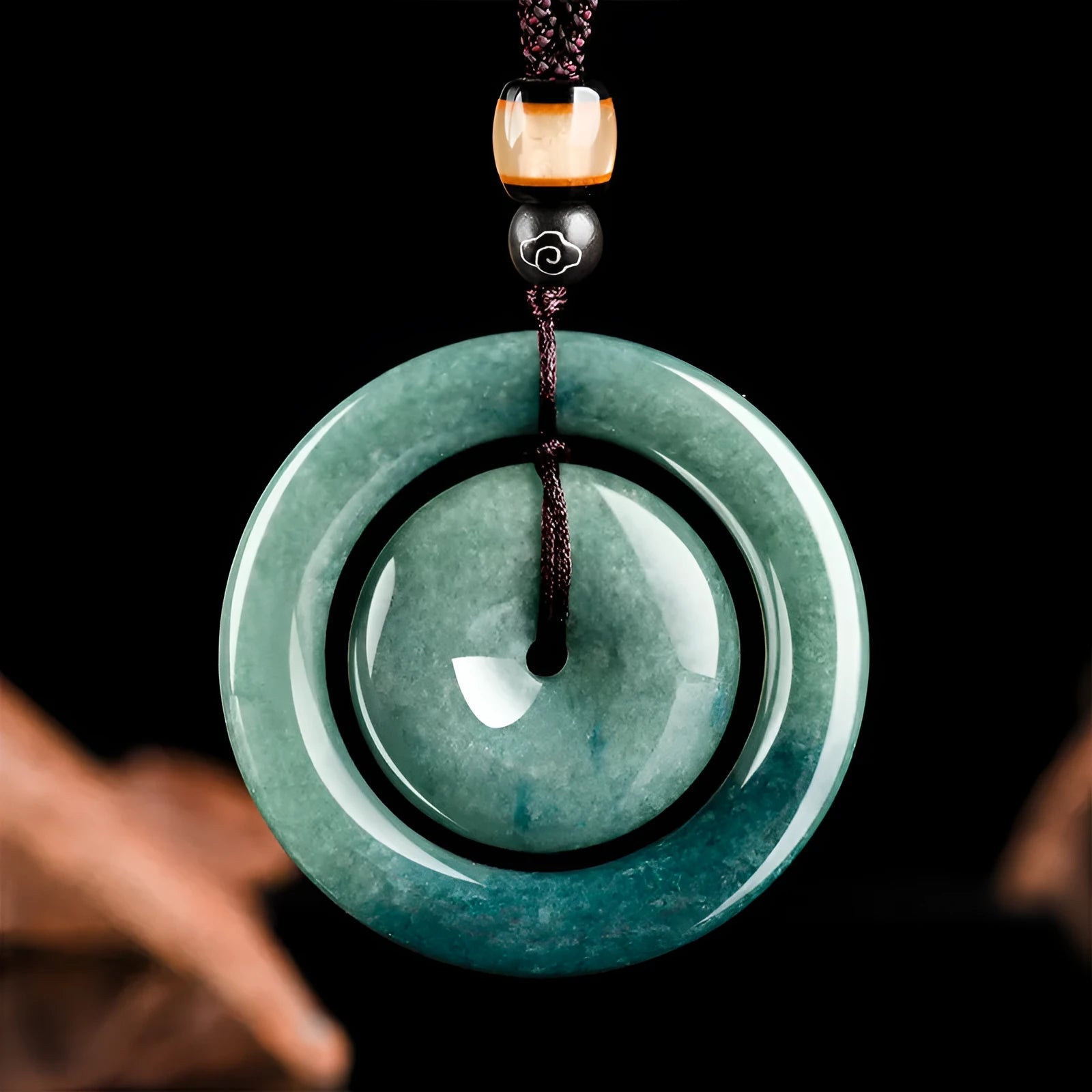 Emerald green carved jade pendant on necklace 21g