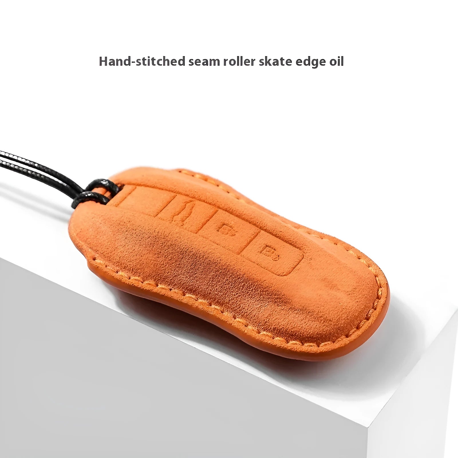 Suede car key cover for Porsche-style fobs in cement grey, dark green, light grey, and orange colour options