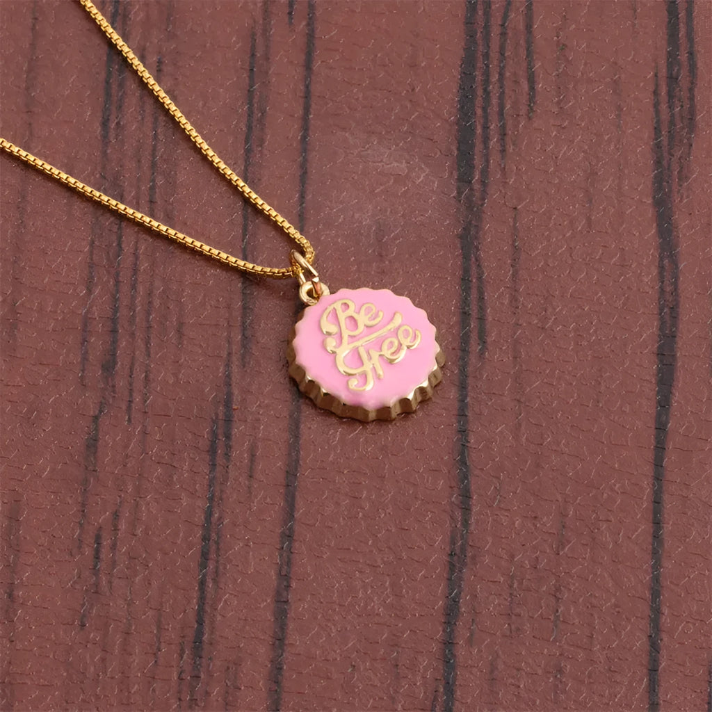 Copper bottle cap pendant necklace with gold electroplating on a box chain, shown in multiple colour options.