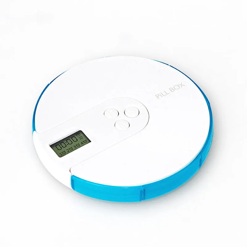 Seven-compartment alarm clock pill dispenser showing medication storage and electronic display