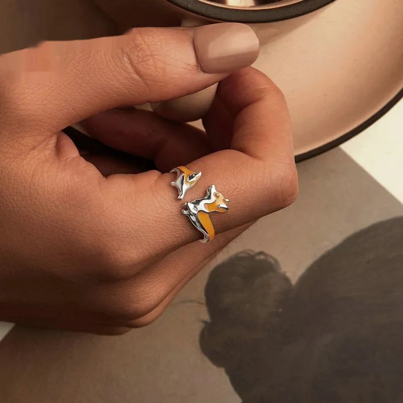 Silver ring with a raised cartoon corgi design in SCR1014-E electroplated colour.