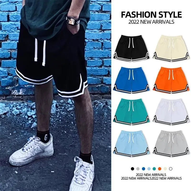 Men's polyester summer shorts with elastic waistband in loose sports style available in multiple colours