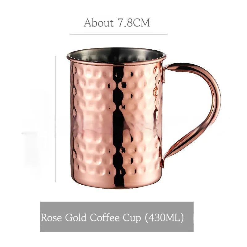 Stainless steel Moscow Mule cup with copper plating in hammer point style showing metallic finish.