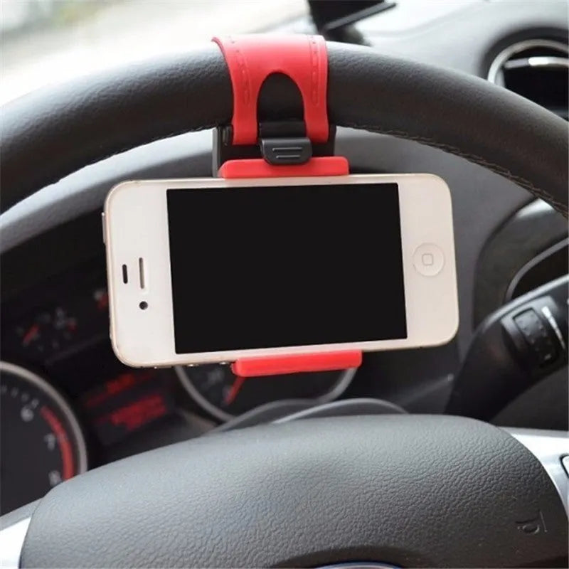 Black steering wheel phone clip mount holding smartphone for car navigation