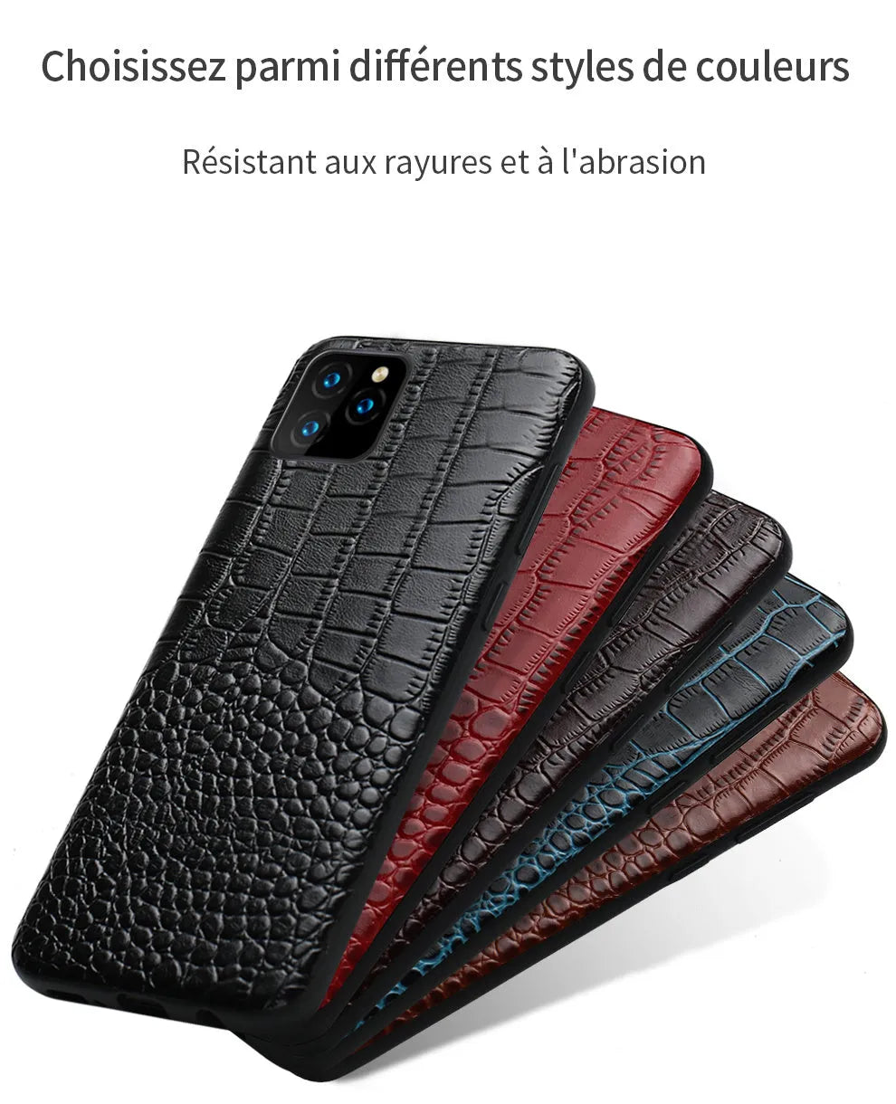 Black leather iPhone case with a crocodile pattern texture lying flat.