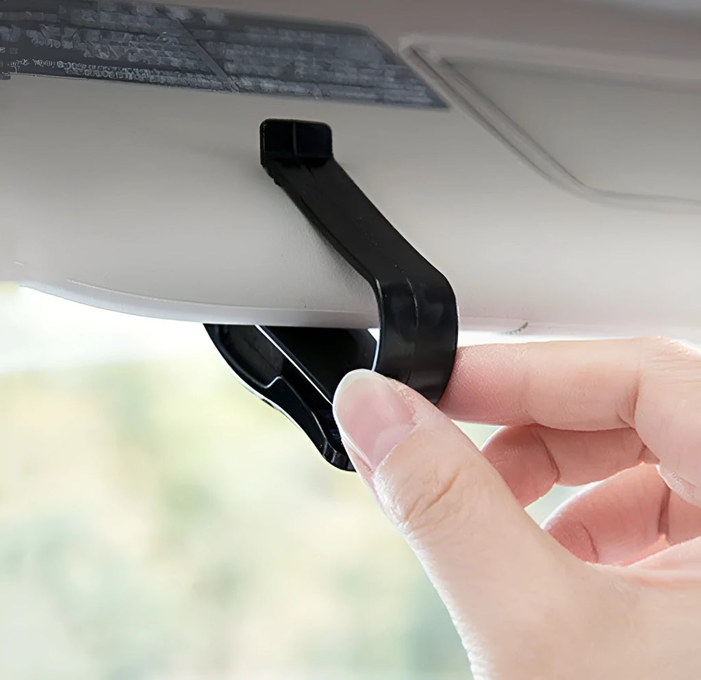 Black plastic car sunshade clip for holding glasses, tickets and ID cards