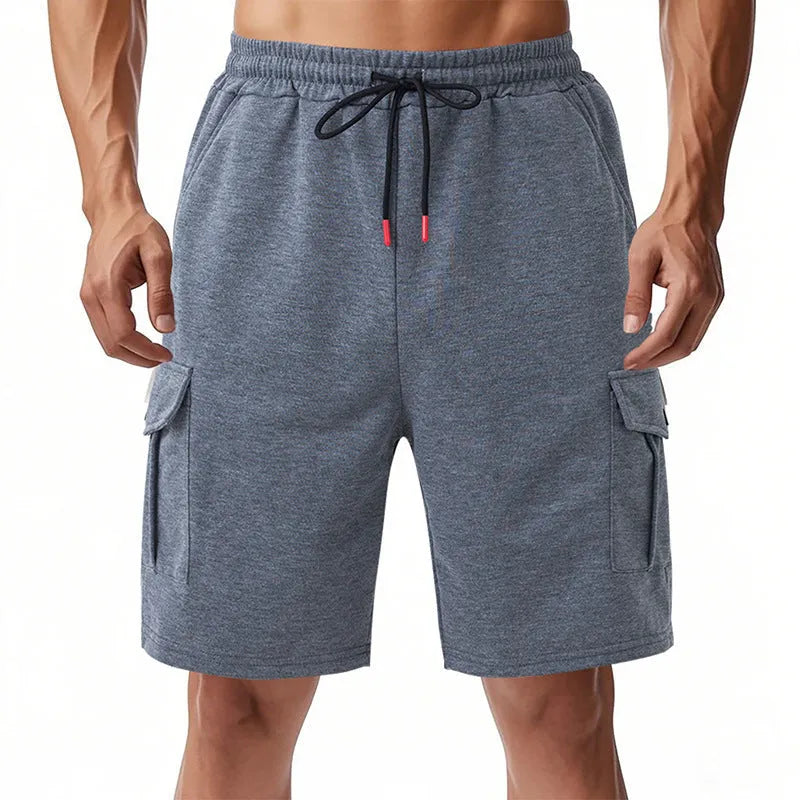 Men's loose fit cargo shorts in terry fabric with multiple pockets available in light grey, black, and dark grey colours