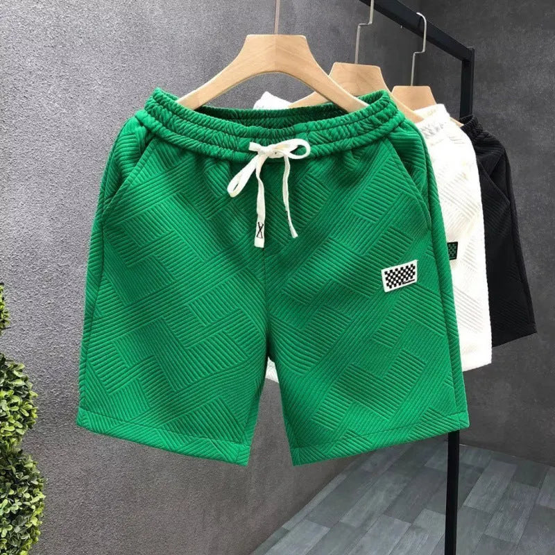 Casual polyester sports shorts in solid colour with micro elasticity, American style design