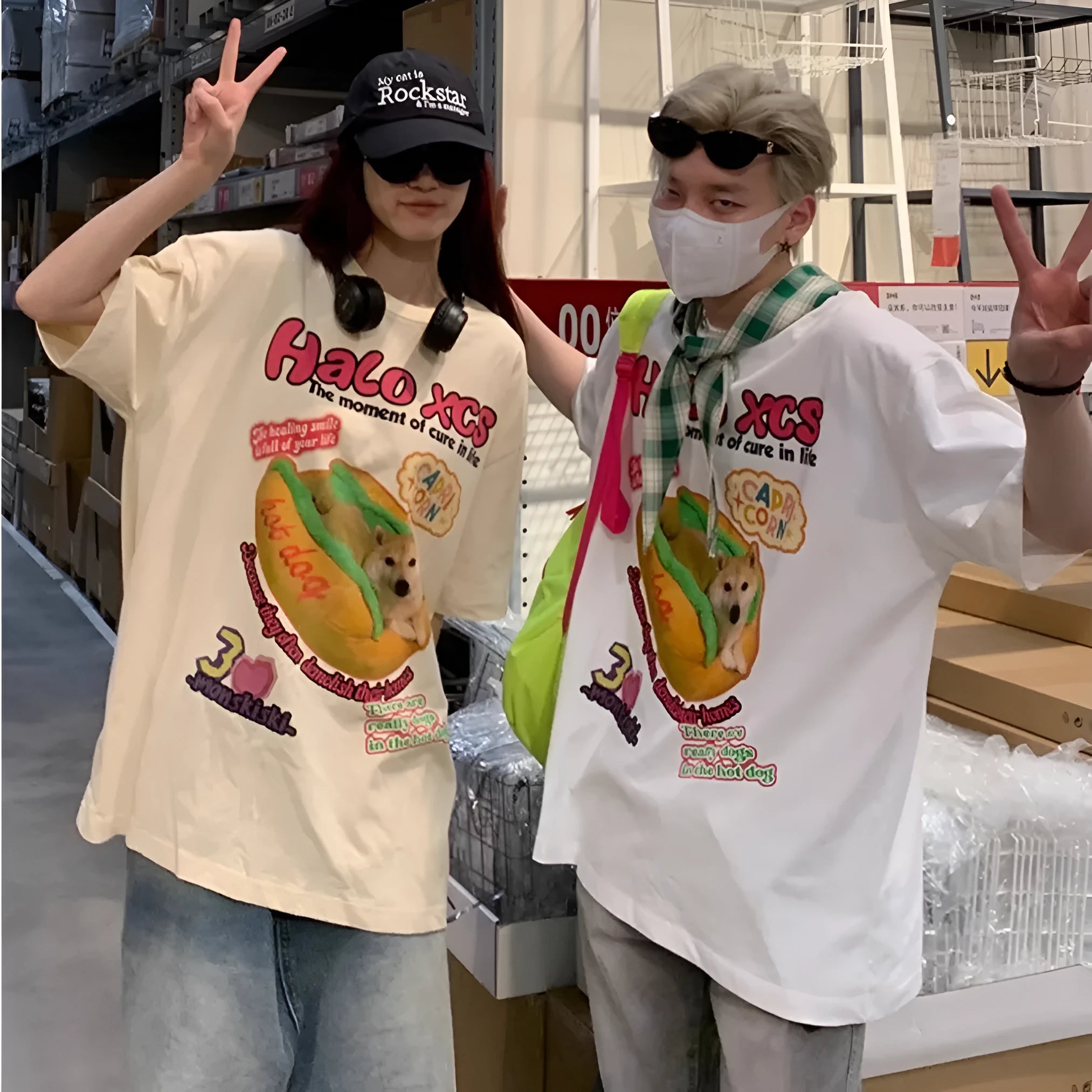 White cartoon hamburger and dog print on a loose-fit cotton T-shirt.