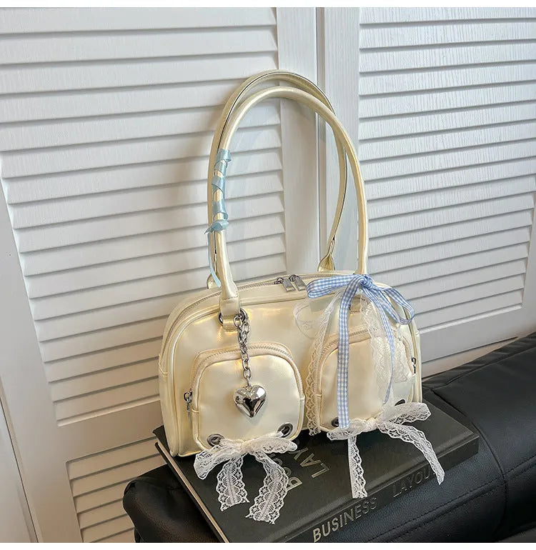 Horizontal square shoulder bag in soft PU with double straps and mobile phone pocket