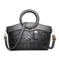 Ladies fabric handbag with multiple zipper compartments in six colour options showing organisational pockets