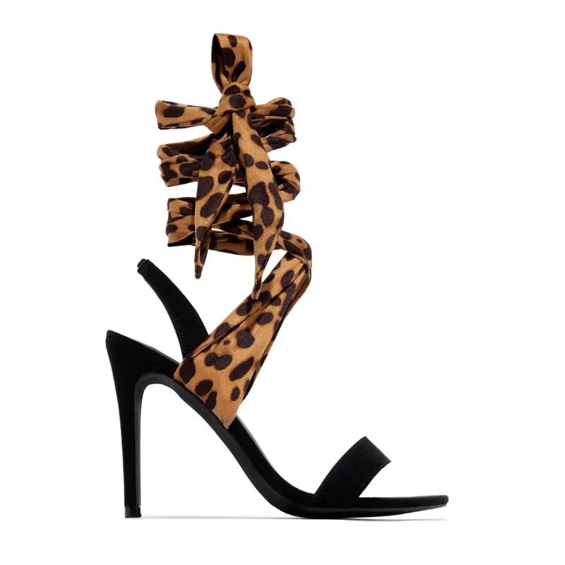 Light brown leopard print Roman style high heels with cross strap design and 8cm heel