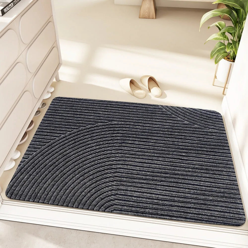 Green cartoon alien pattern diatom oil floor mat measuring 60 by 90 centimetres with a wire ring shape.