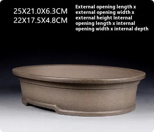 Handmade antique oval purple sand bonsai pot measuring 25x21x6.3cm