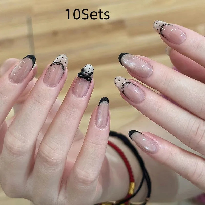 False nails for girls showing short square and coffin shapes in various solid and sparkle colours
