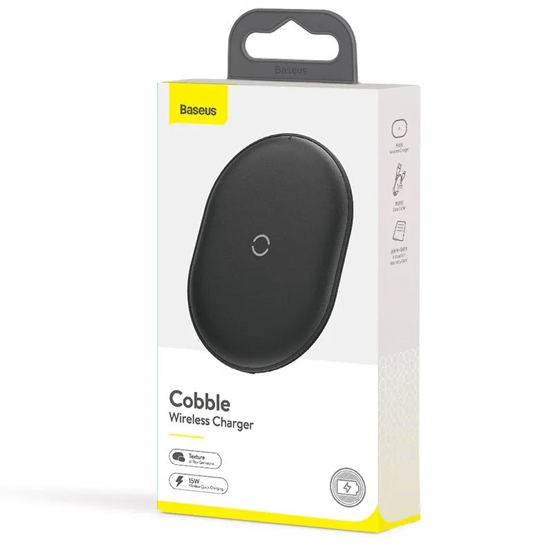 Baseus rough-textured 15W wireless charging pad for mobile phones in black on a desk.