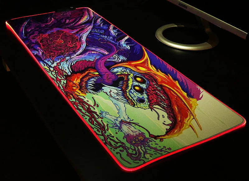 Symphony gaming light-emitting mouse pad with RGB illumination on a desk, 300x600x4mm size option
