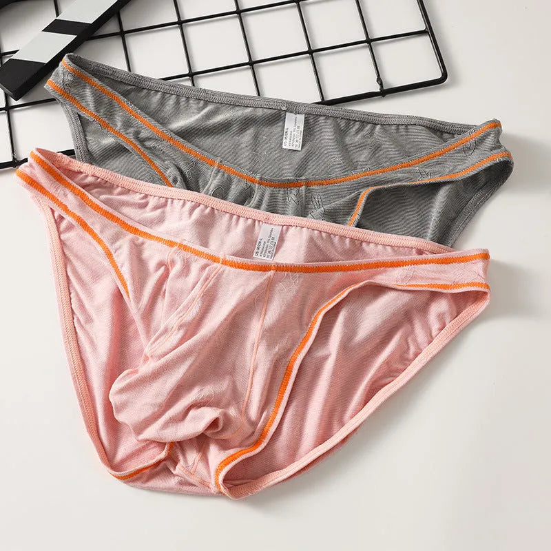 Men's modal ice silk underwear with butt-lift design shown in multiple colours.