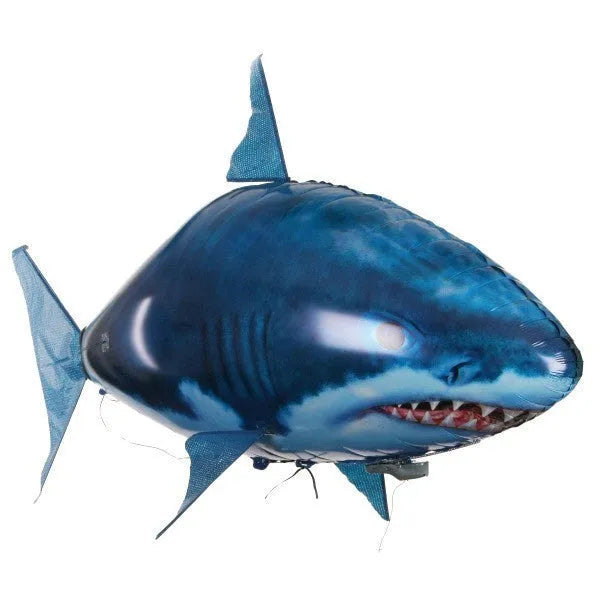 Large remote control Shark inflatable balloon toy flying indoors with side-swaying tail.
