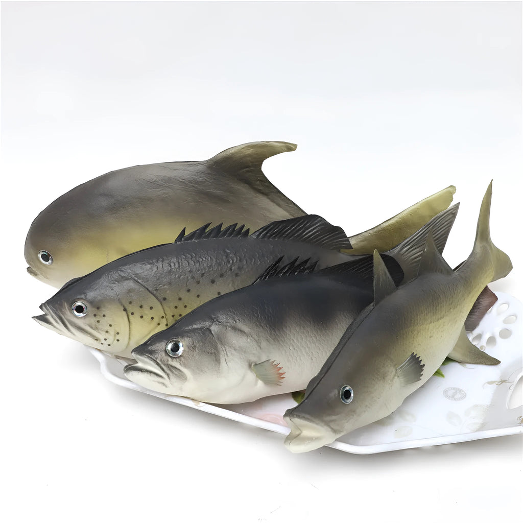 Three PU simulated fish ornaments showing yellow-fin tuna, yellow croaker, and flower fish designs for marine decoration