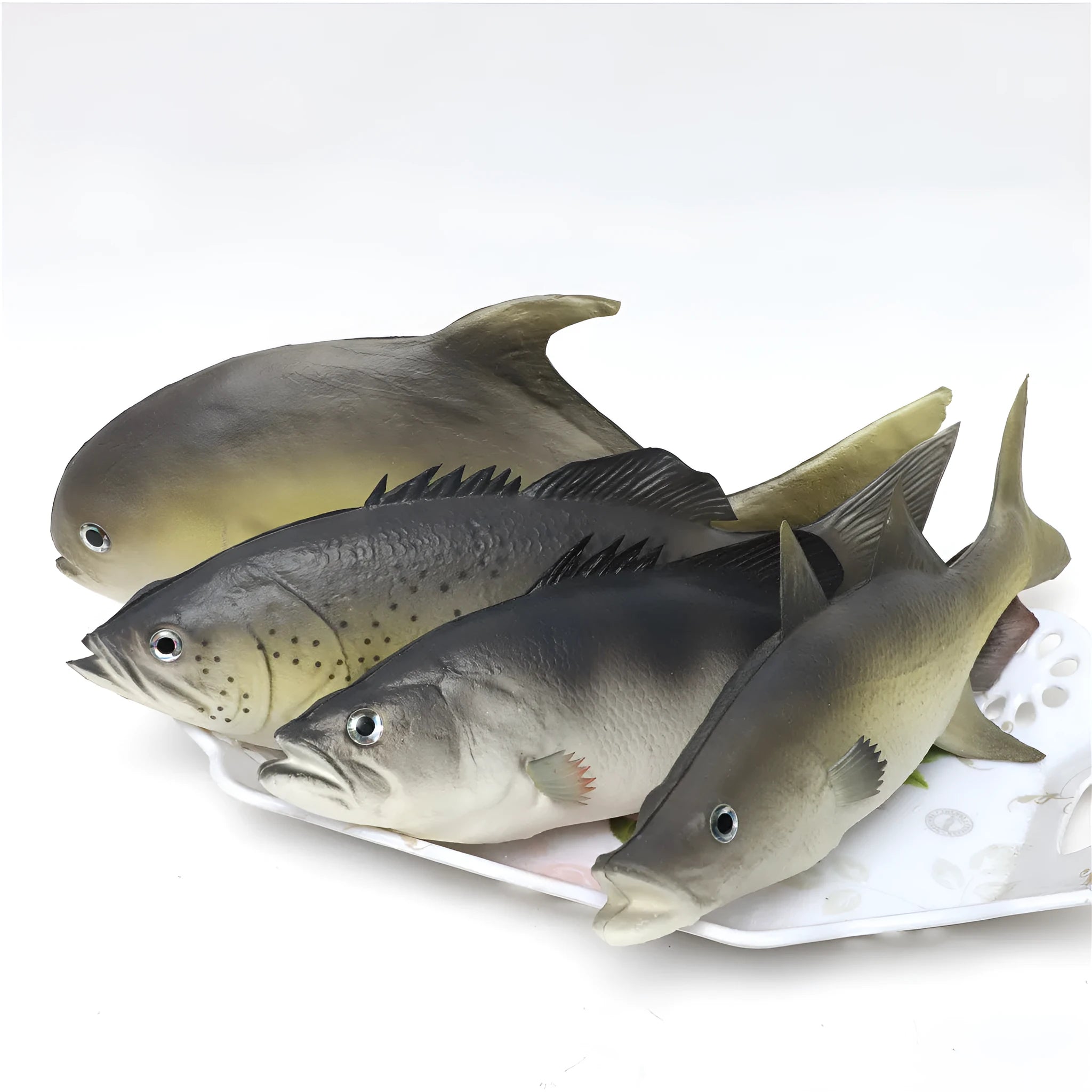 Three PU simulated fish ornaments showing yellow-fin tuna, yellow croaker, and flower fish designs for marine decoration