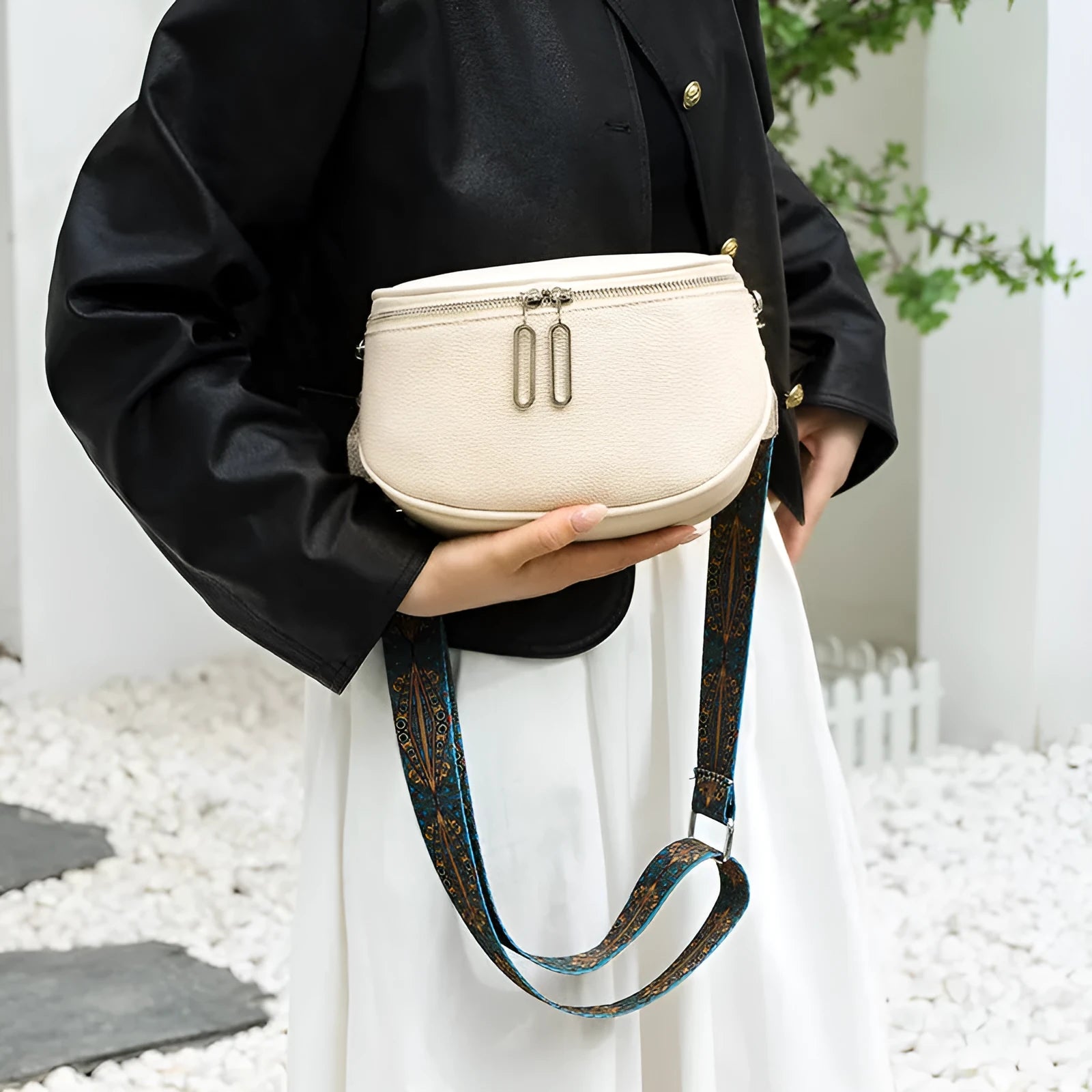 Women's black PU leather casual messenger bag with saddle shape and cross-body strap
